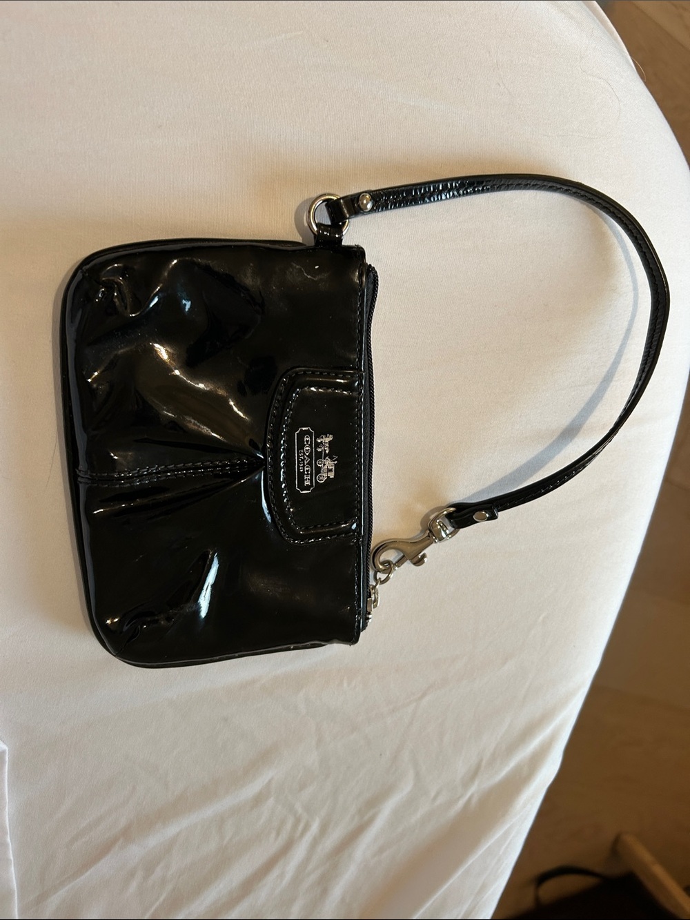 Glossy black Coach Madison patent leather small wristlet